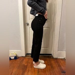 LIKE NEW RE/DONE high rise stove pipe straight leg raw hem jeans